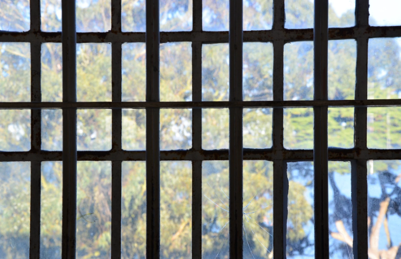 view through prison bar window